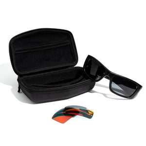 The inside of the Revant Keeper sunglass case with sunglasses and lenses around it