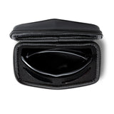 A top view of the open Revant Keeper sunglass case with high wrap sport sunglasses inside it