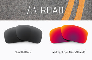 Two Stealth Black lenses stacked on top of each other on the left and two Midnight Sun with mirrorshield lenses stacked on top of each-other on the right.